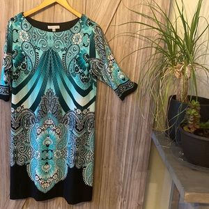 Green and black dress.